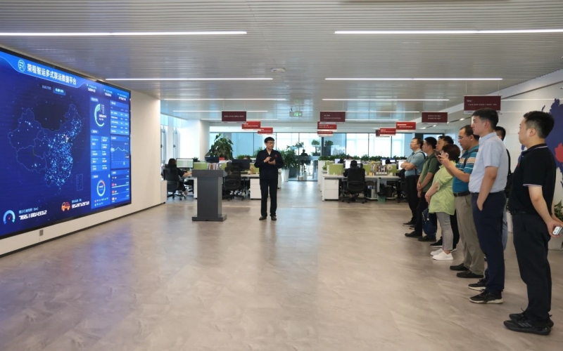 交通运输部科学研究院、中国交通报社相关领导到QY千亿集团调研座谈